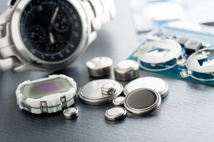 Button batteries and a watch