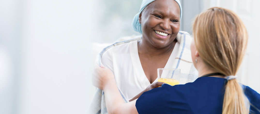 Palliative Care Nurse with Patient