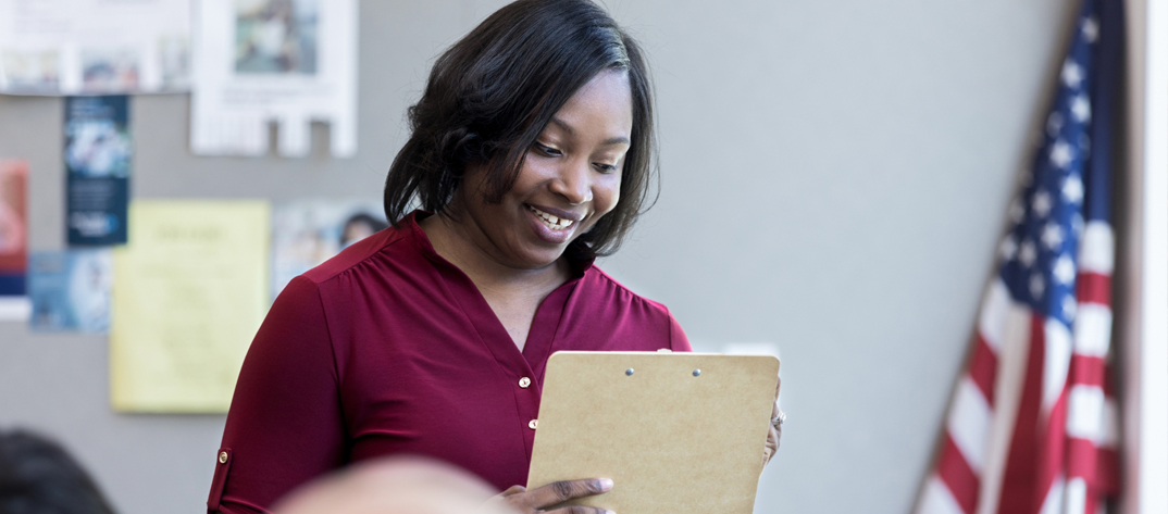 Veteran Specialty Student reviewing notes in a classroom setting