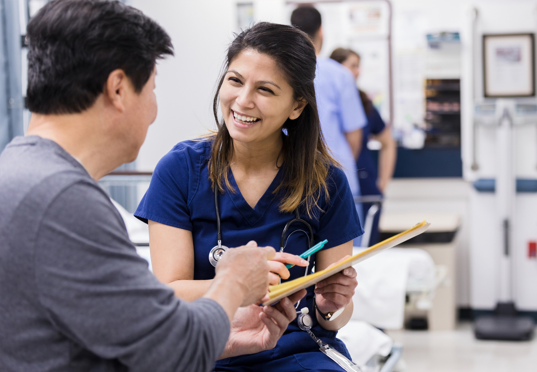 Cardio Nurse speaking with patient