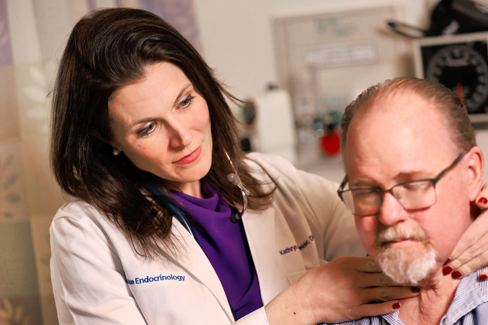 Kathryn Evans Kreider working with a patient