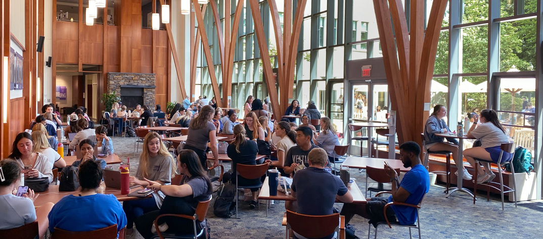 Students gathering in the School of Nursing Atrium