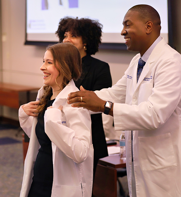 CRNA Student receiving her white coat