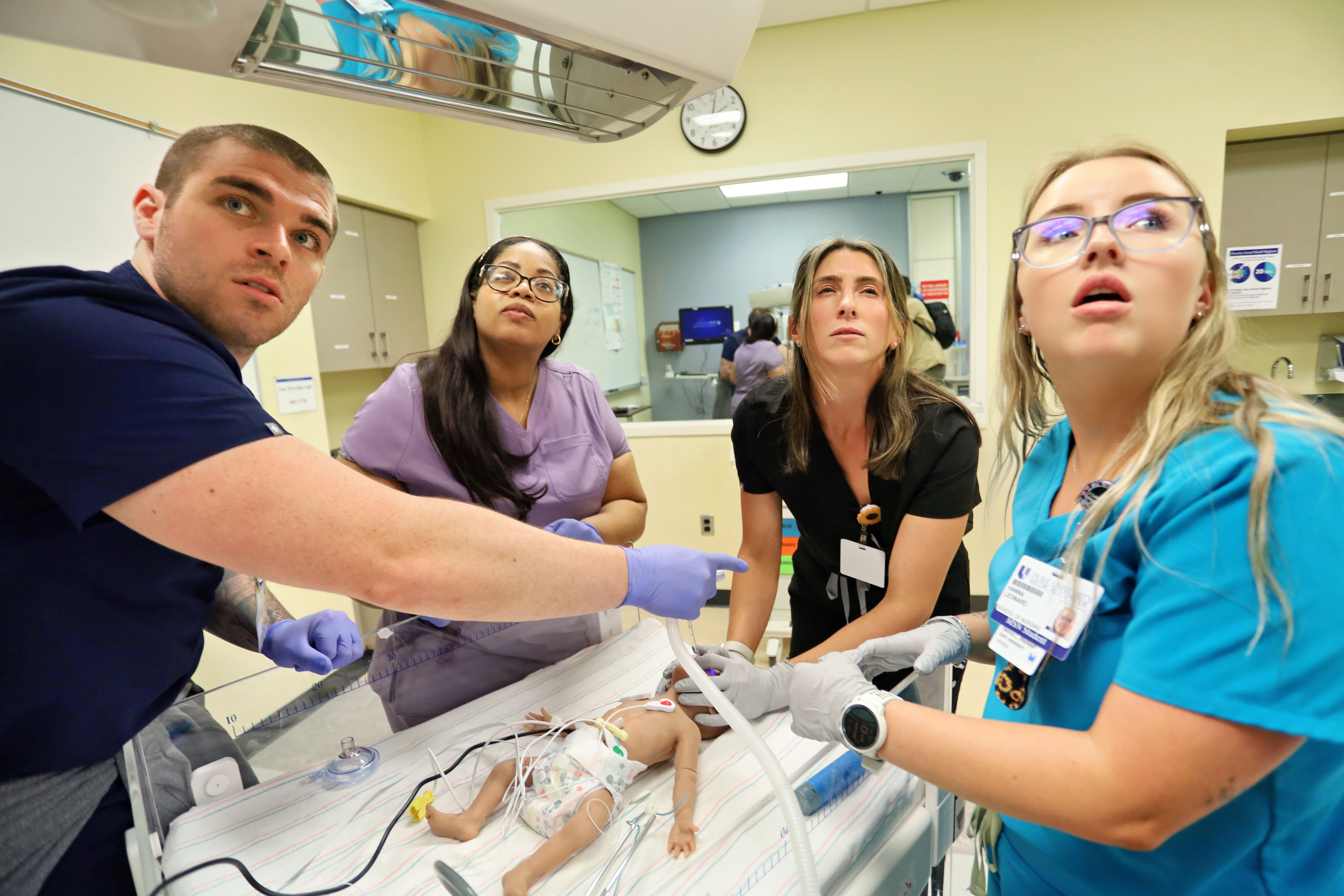 Duke nursing school students in neonatal simulation