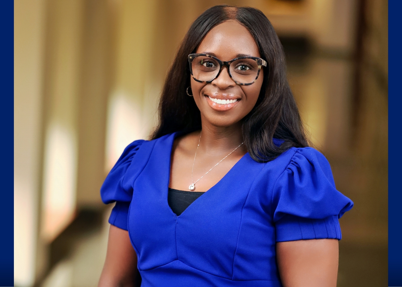 University Scholar Jamessa Dunham posing in a hallway