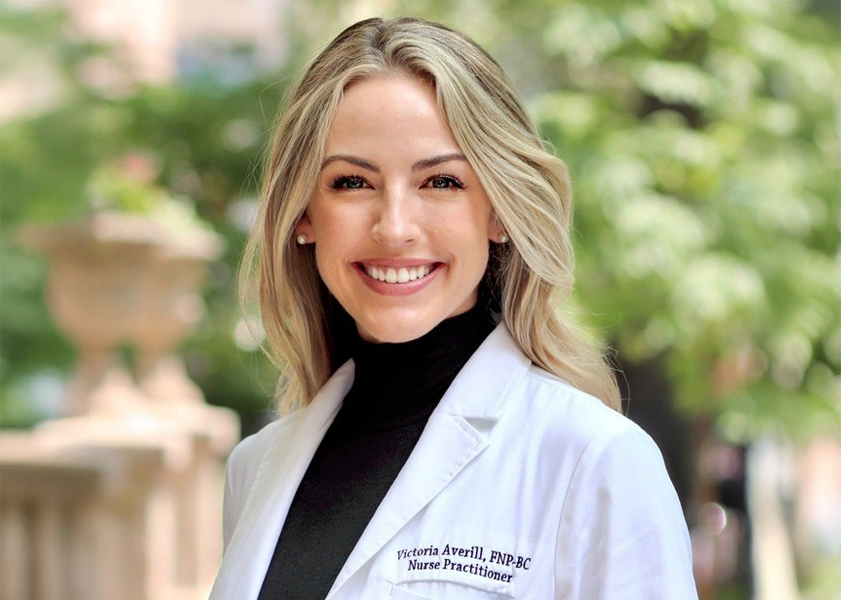 Victoria Averill in a white coat