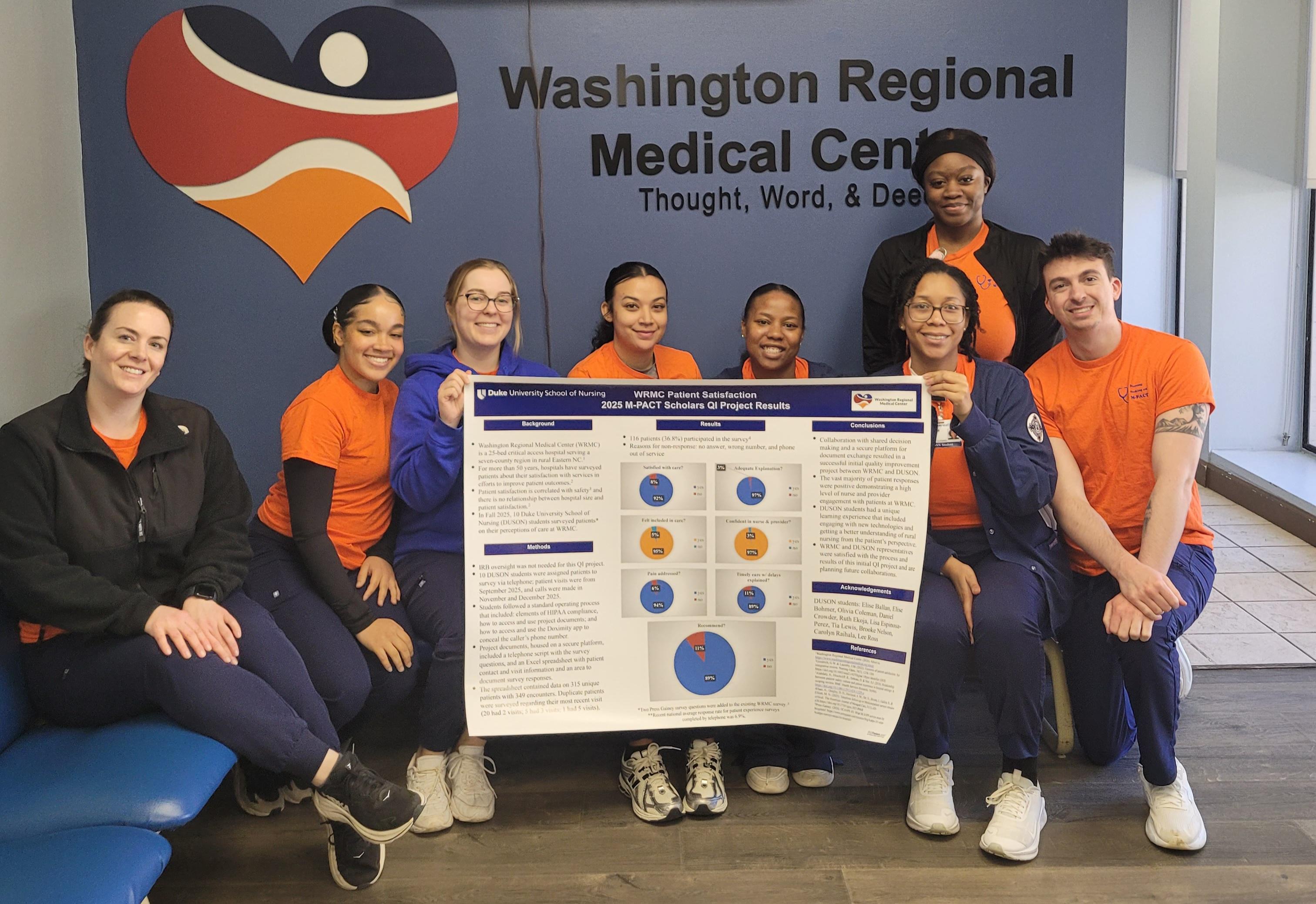 Duke University School of Nursing students holding poster at Washington Regional Medical Center