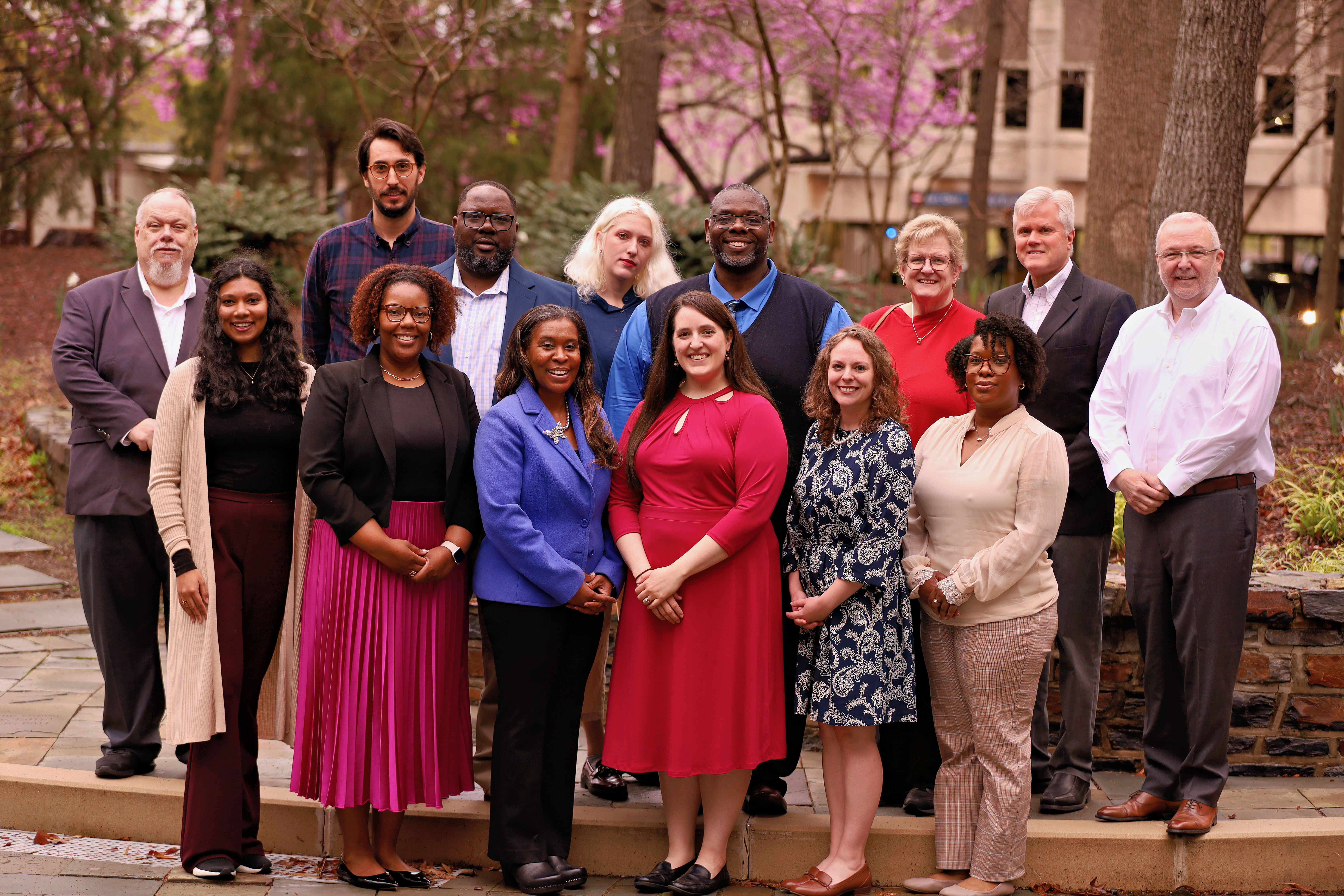 The cohort of the 2026 Staff Leadership Development Program cohort poses outside Pearson Building