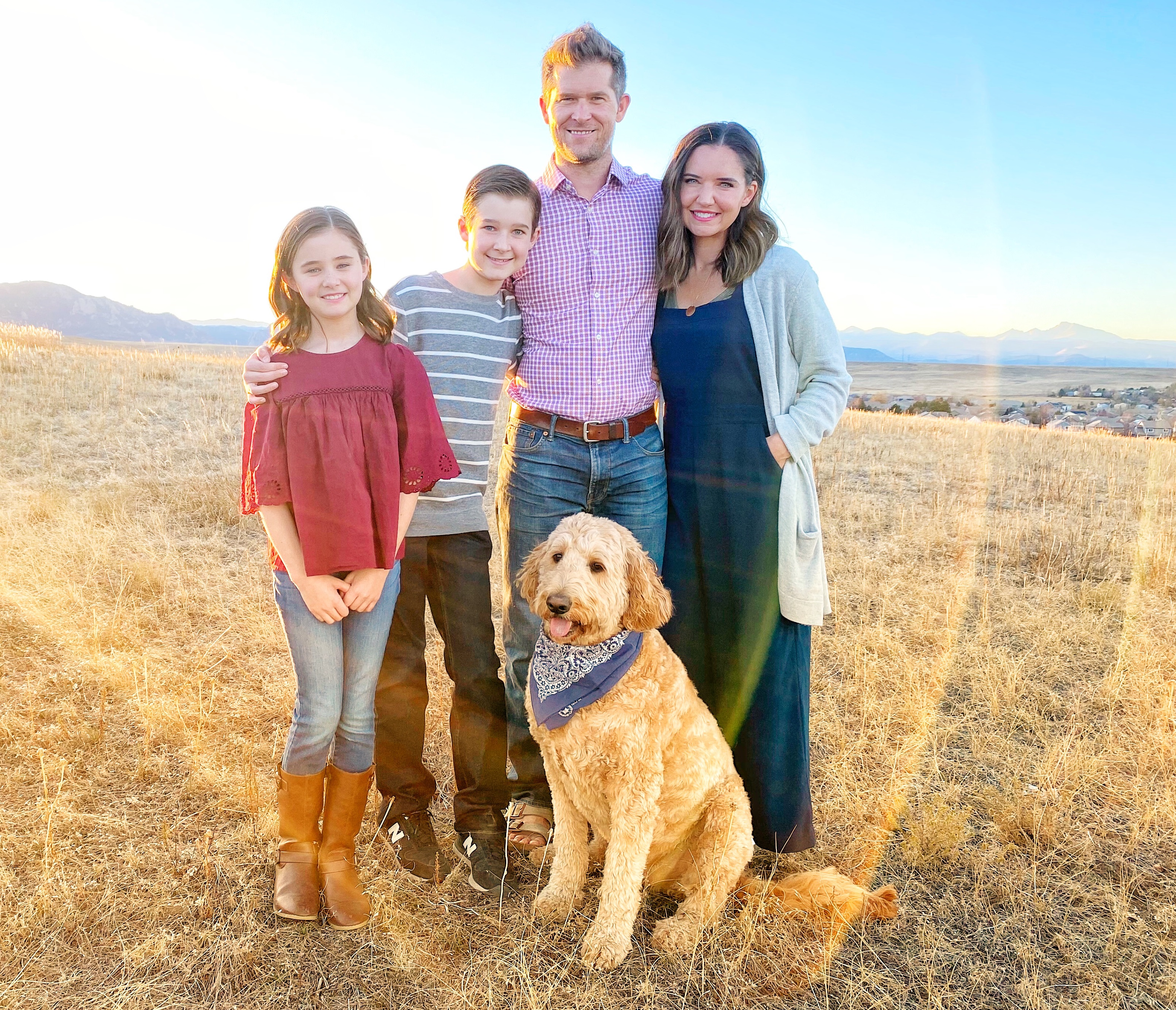 dnp alumna amber johnson with her husband and two children