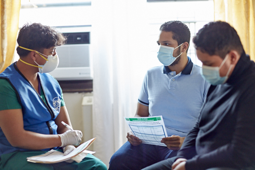 three people talking about health topics