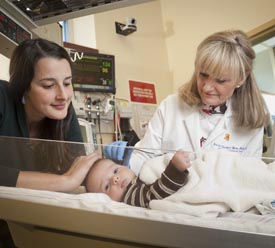 Nurse Practitioner caring for baby