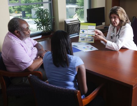 Care coordinator meeting with patient and family