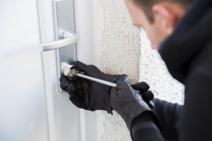 Burglar Picking Lock