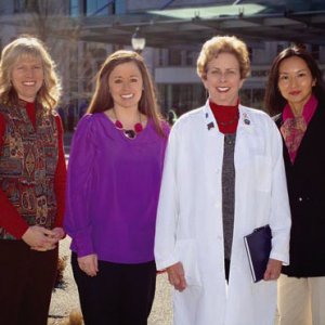 Oncology students with professor