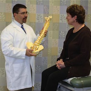 Orthopedic nurse practitioner with patient