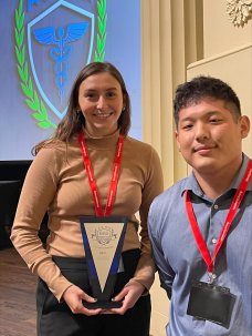 brian oh olivia Myszewski with aamn award