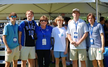 Faculty Member with Family at Homecoming