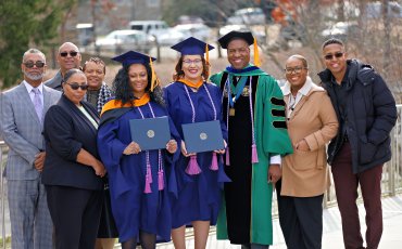 School of Nursing Gradute with Family