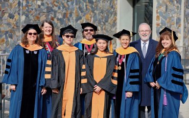 Interim Dean Relf with PhD Graduates