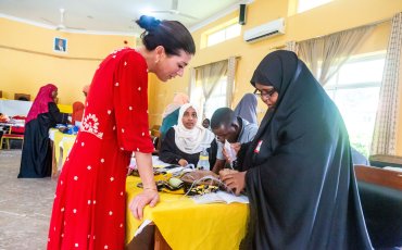 Gina Wilson, left, with a midwife during a training