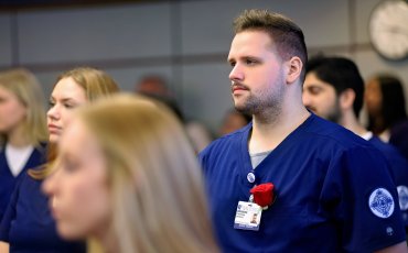 Shepler stands during his first semester pre-licensure Commitment to Excellence ceremony.