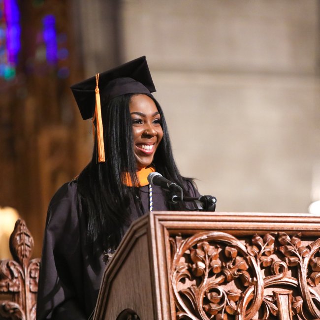 Graduate at podium