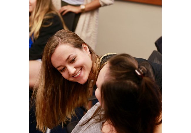 Two nursing students laughing