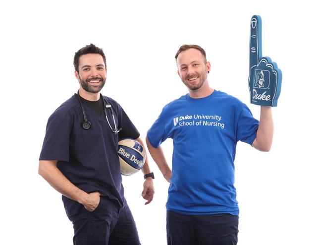 Male Nursing Students with foam finger