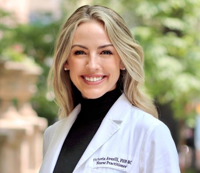 Victoria Averill in a white coat