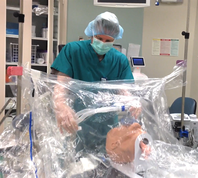 tony stands and demonstrates i-drape