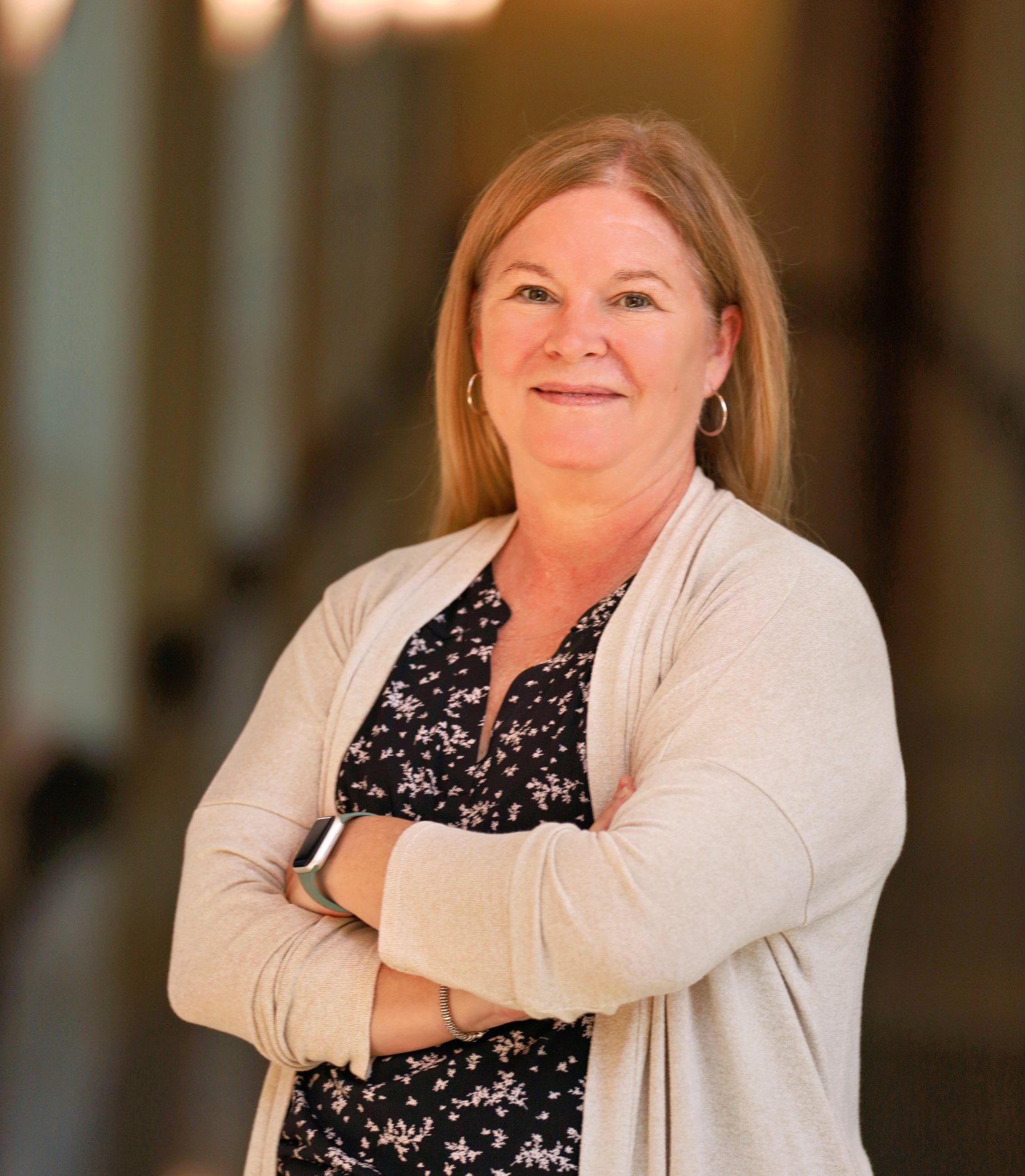 Shannon Monroe stands in Admissions hallway of Pearson Building at the Duke University School of Nursing