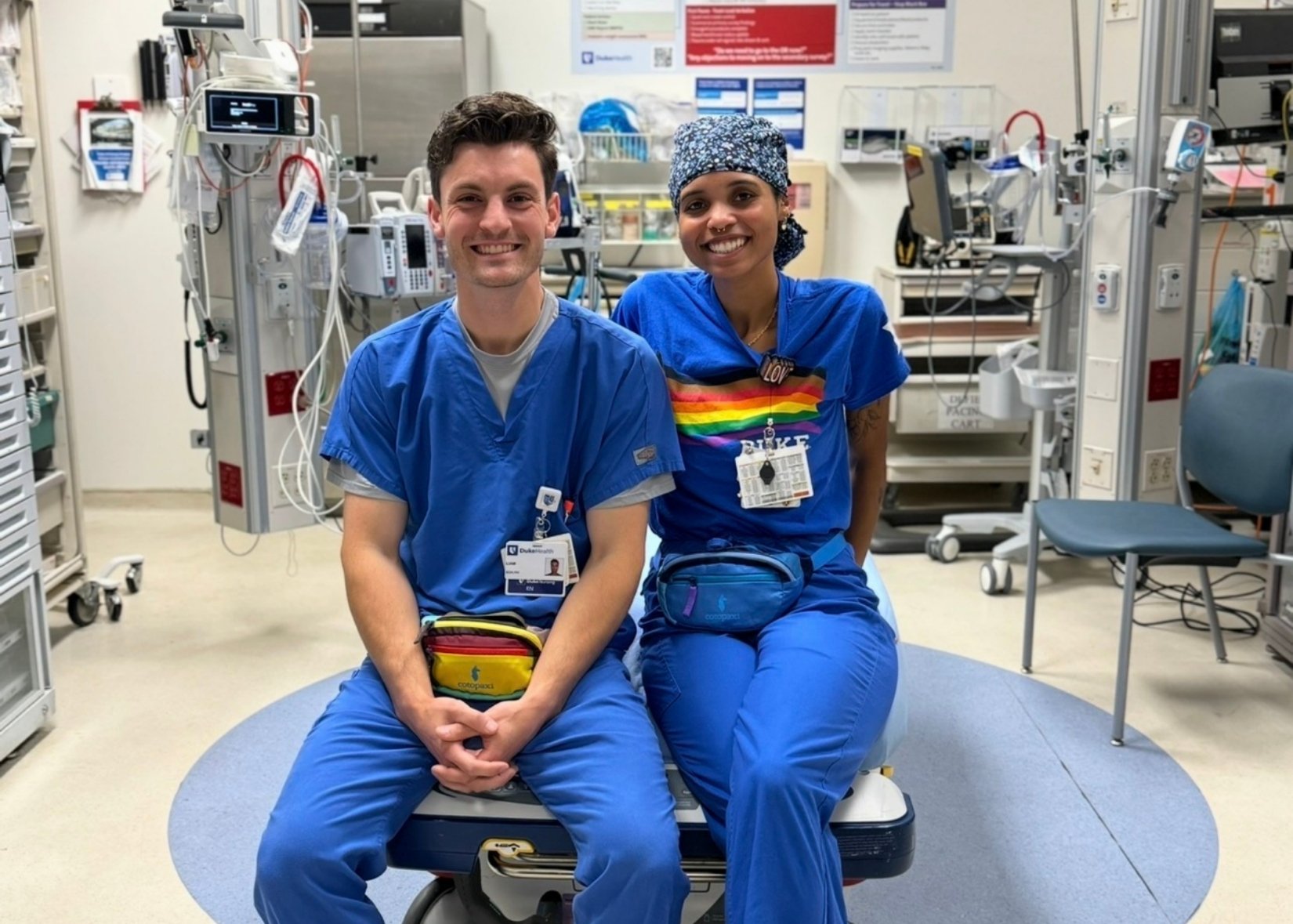 Two nurses in blue scrubs in the Emergency Department