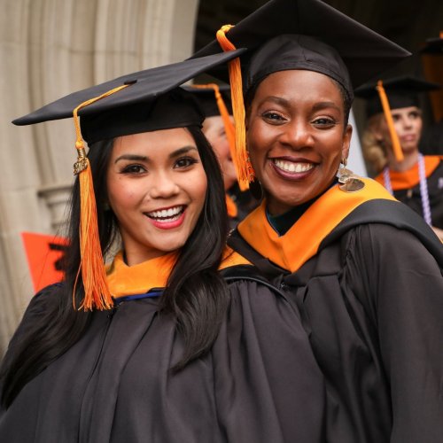two women graduation outfits