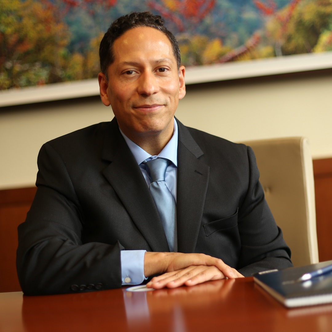 vincent guilamo-ramos sitting at desk